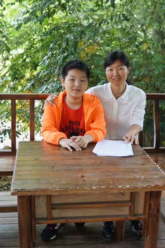 老师妈妈的小学生作文_学生眼中的老师妈妈_我的美母教师